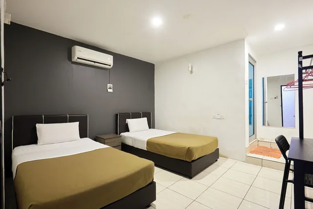 غرفة ديلوكس بسريرين منفصلين، Uncle Guesthouse Kuala Terengganu by ZUZU 1/7