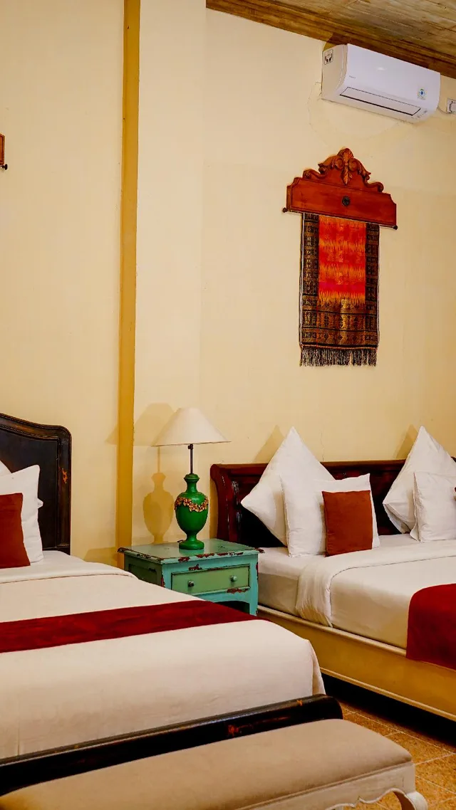 غرفة عائلية بسرير كوين وسرير فردي، Kayu Arum Resort 1/2