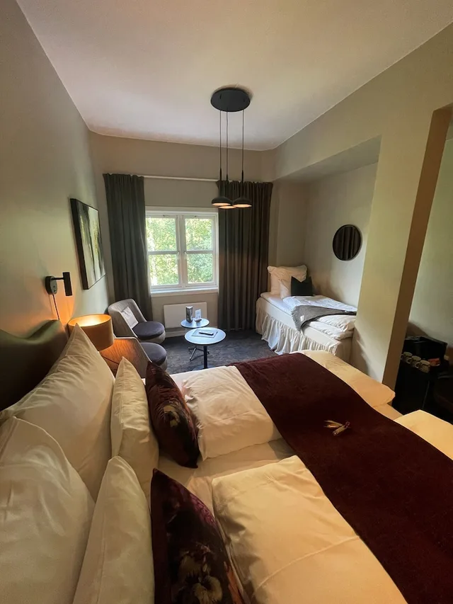 غرفة كلاسيكية ثلاثية بسرير كينج وسرير فردي، Molla Hotel 2/7