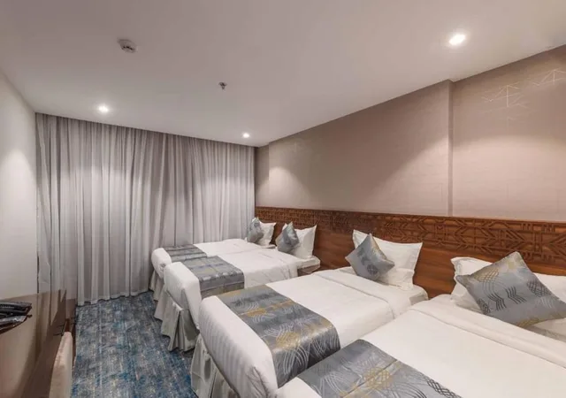 غرفة رباعية بأربعة أسرّة، فندق منازل الزائرين(Manazel Al Zaireen Hotel) 1/3