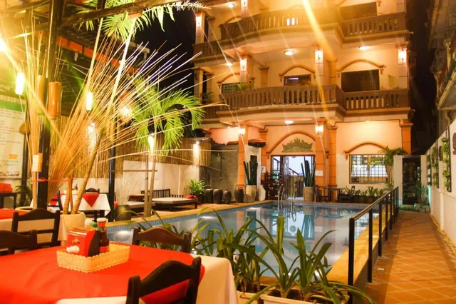 Family, 1 Double and 1 Single Bed, with Fan، Tropical Breeze Guesthouse 1/1