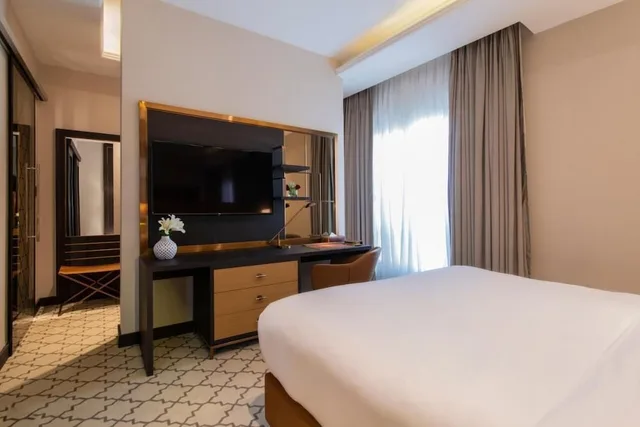 غرفة بريميوم بشرفة مفردة بسرير كينج، فندق وسكن جاردينو(Gardino Hotel and Residence) 1/1