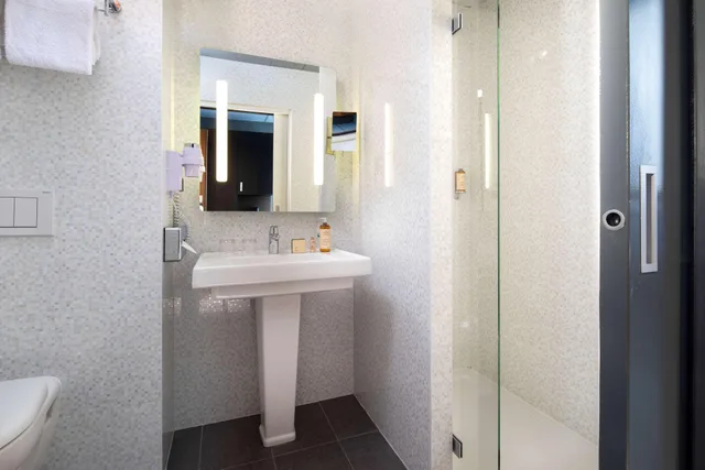 غرفة بسريرين كوين، Best Western Plus Hotel Isidore 5/9
