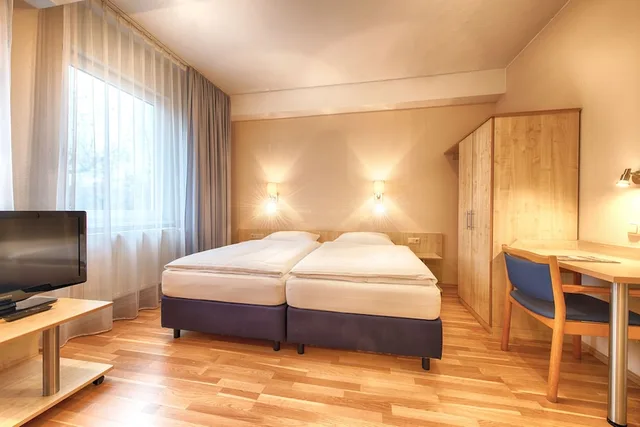 غرفة كومفورت بسرير كوين، Enjoy Hotel Berlin City Messe 3/5