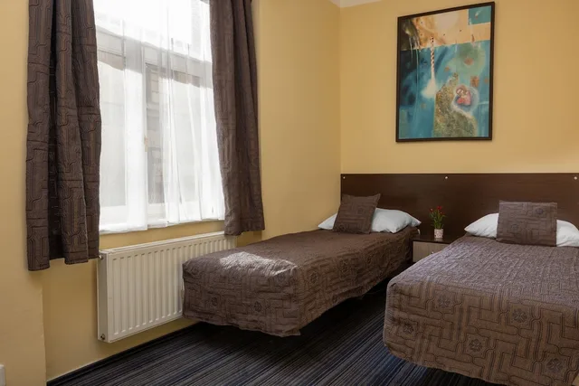 شقة عائلية بسرير كوين وسريرين فرديين بغرفتي نوم، Anyday Apartments 6/10