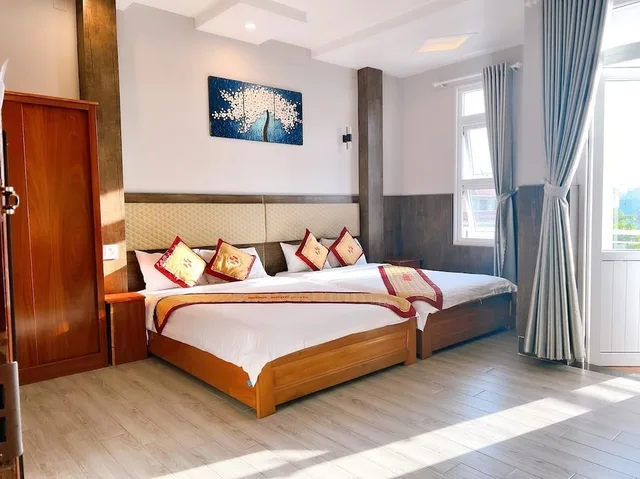 غرفة قياسية ثلاثية بسرير مزدوج وسرير فردي، Hong Ngoc Hotel 1/5