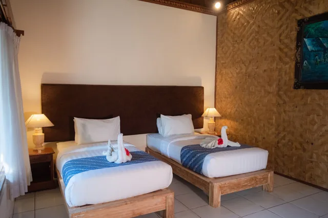 بنغل بسرير كينج بإطلالة على الحديقة، Geringsing Bungalows 1/7