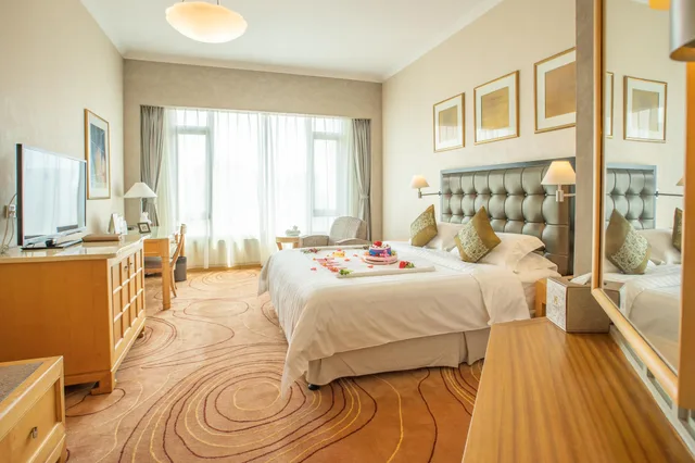 غرفة ديلوكس بسرير كينج وسرير كوين، Shantou Junhua Haiyi Hotel 2/2