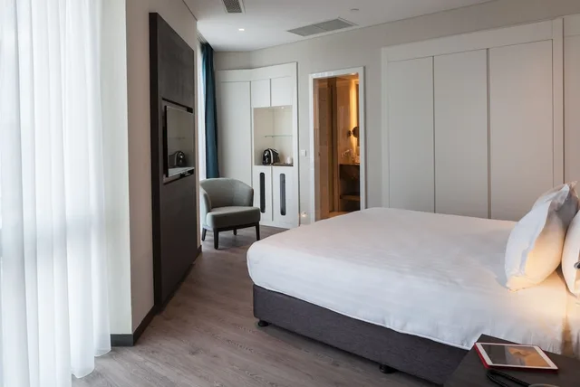 غرفة تنفيذية بسرير كينج، Wish More Hotel 1/10