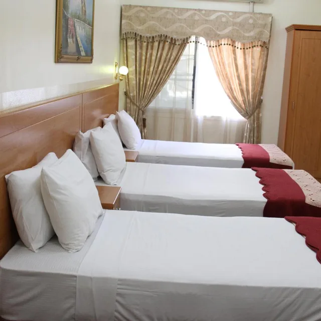 غرفة كلاسيكية رباعية بسرير فردي، Al Ahrar Hotel 5/6