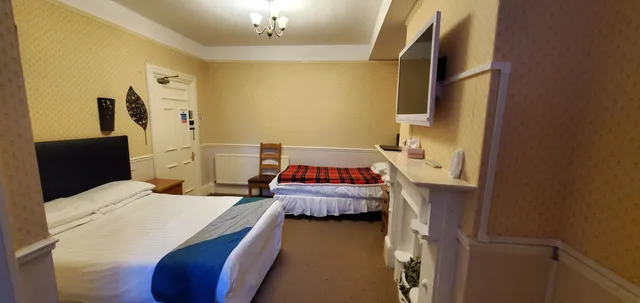 غرفة قياسية ثلاثية بسرير مزدوج وسرير فردي، Diamonds Guest House 6/10