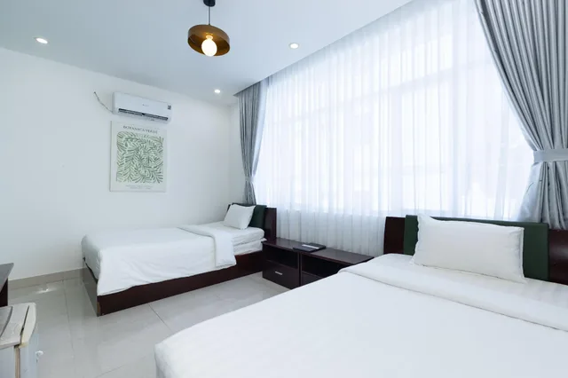 غرفة بسريرين منفصلين بإطلالة على المدينة، HAKU Boutique Hotel Vung Tau 1/1