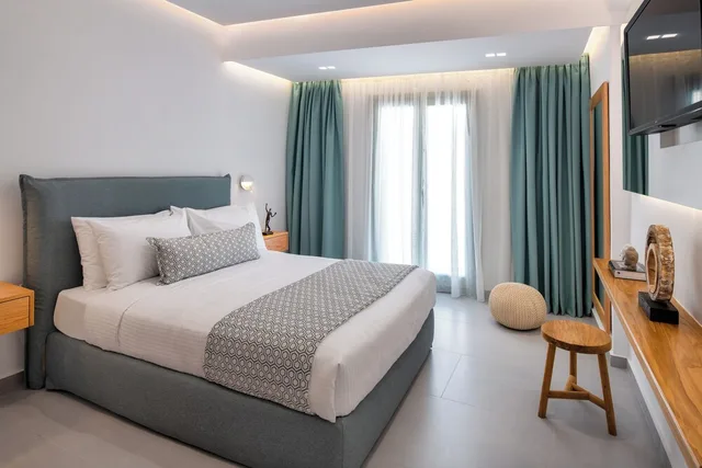 جناح ديلوكس بسرير كوين مع أريكة، Harmony Suites 9/10