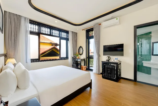غرفة ديلوكس بإطلالة على الحديقة، Lantern Boutique Hoi An 1/2