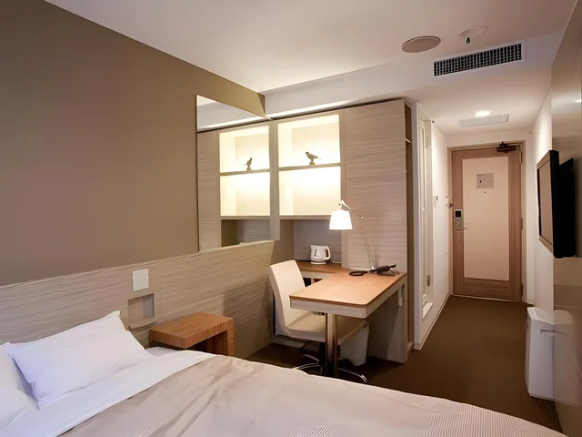 غرفة ديلوكس بسرير نصف مزدوج وسريرين منفصلين، Hotel Sorriso Hamamatsu 1/1