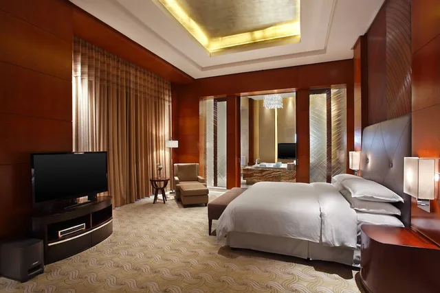 غرفة ديلوكس بسرير كينج، Sheraton Jinzhou Hotel 2/3