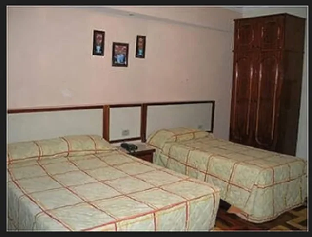 غرفة رباعية بسرير مزدوج وسريرين منفصلين، Itajuba Hotel 2/6