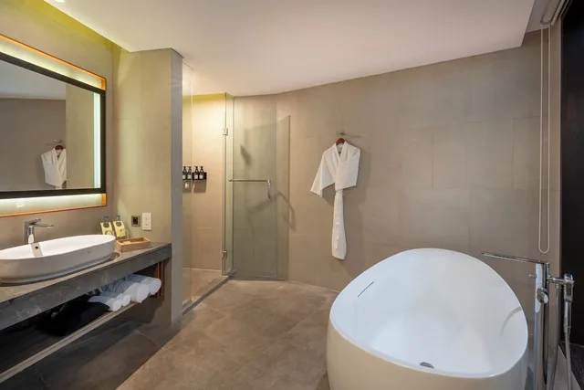 غرفة بريميوم ديلوكس بسرير كينج بإطلالة على الحديقة، Pullman Bali Legian Beach 4/7