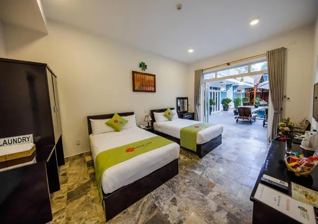 غرفة ديلوكس ثلاثية بسرير كوين وسرير فردي، Lucky Leaf Villa 1/1