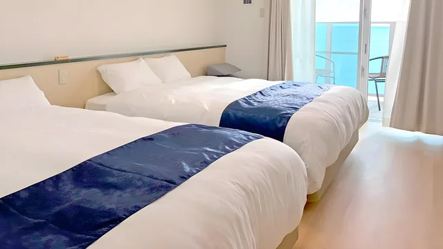 غرفة قياسية بسريرين منفصلين بإطلالة على البحر في طابق مرتفع، Hotel Sakurano Familia 1/1