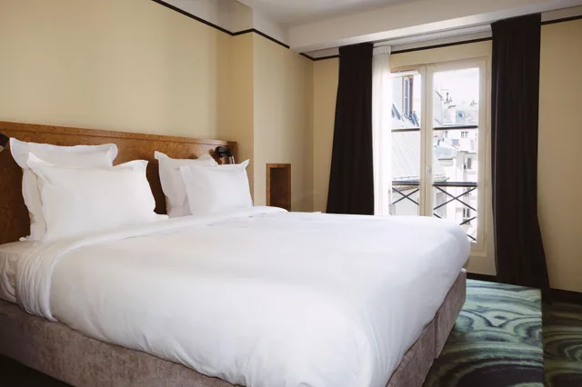 غرفة ديلوكس بسرير مزدوج أو سريرين منفصلين بإطلالة على الفناء، 1k Hotel 1/6
