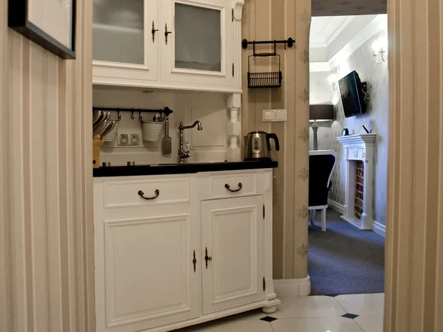 جناح جونيور ديلوكس بسرير كوين مع أريكة، Sleepwalker Boutique Suites 3/3