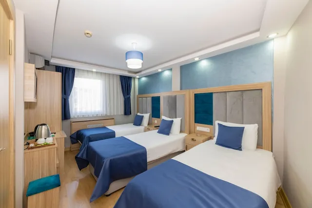 غرفة قياسية ثلاثية بثلاثة أسرّة بإطلالة على المدينة، Yesilpark Hotel 3/4