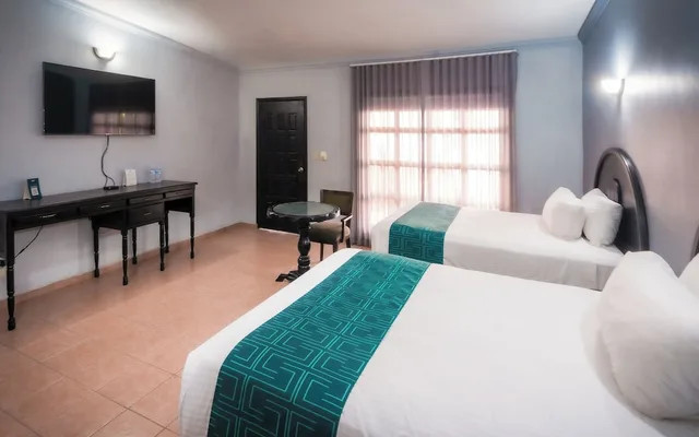 غرفة قياسية بسريرين مزدوجين بإطلالة على الحديقة، InHouse Select Hacienda Tres Rios 3/10