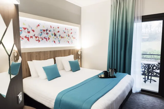 غرفة بسرير كينج، Brit Hotel Figeac 1/8