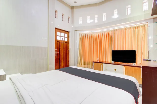 غرفة ديلوكس بسرير مزدوج بشرفة، Hotel O Yogyakarta near Jogja City Mall formerly Bama Guesthouse 9/10