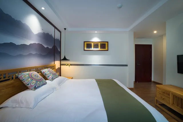 غرفة ديلوكس بسرير كوين، Riverside Inn Guilin Central 4/5