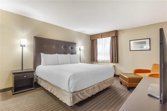Suite, King Bed, Sofa, Exterior Entrance, Best Western Cold Lake Inn 2/2