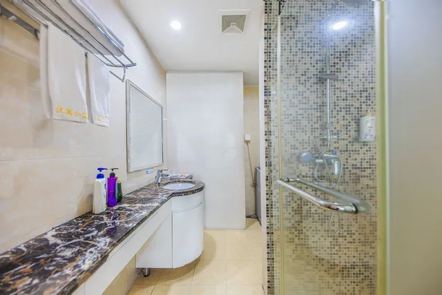 غرفة بزنس ثلاثية بسريرين مزدوجين، Home Inn Huayi Apartment 9/10