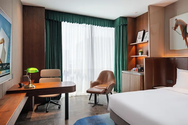 غرفة ديلوكس بسرير كينج، Novotel Shanghai Baoshan Jiusi 2/4