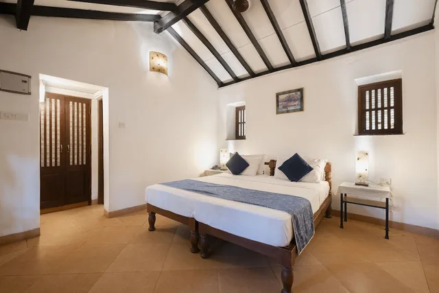 غرفة قياسية بسرير مزدوج بشرفة، Granpas Inn Bougainvillea 1/6