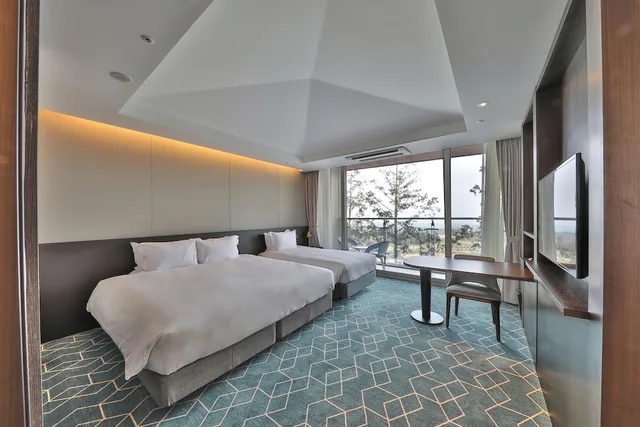 غرفة عائلية بسريرين منفصلين وسرير مزدوج وسرير فردي، Camphortree Hotel And Resort 1/3
