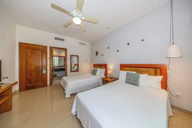غرفة أساسية ثلاثية بسريرين كوين، Riviera Maya Suites 3/10