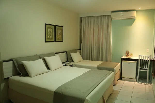 غرفة ديلوكس ثلاثية بسرير مزدوج وسرير فردي، Hotel Maysa 1/4