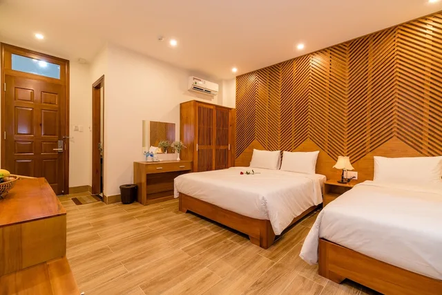 Deluxe, Triple, 1 King and 1 Single Beds, City View, Balcony, Phong Phu Villa Hoi An 3/6