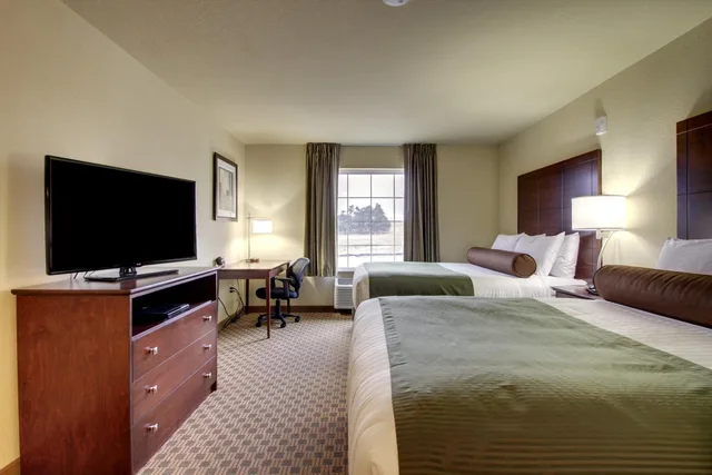غرفة ديلوكس بسرير كوين، Cobblestone Hotel & Suites - Pulaski 1/10