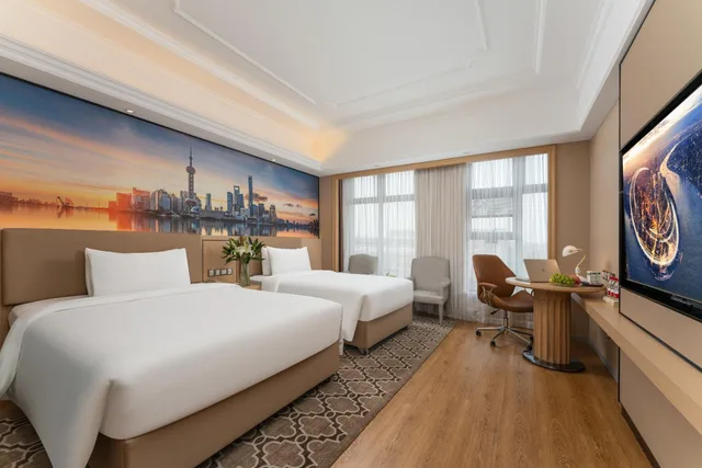 غرفة ديلوكس عائلية، Vienna Hotel Shanghai International Resort Shanghai Pudong International Airport 1/1