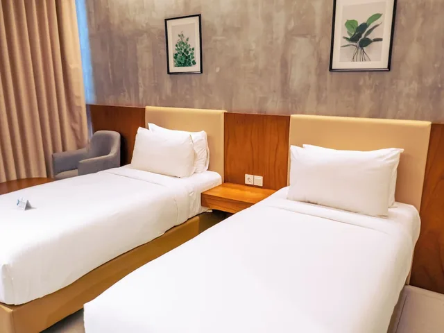 غرفة ديلوكس بسريرين منفصلين بإطلالة على الحديقة، Kambaniru Beach Hotel and Resort 2/6