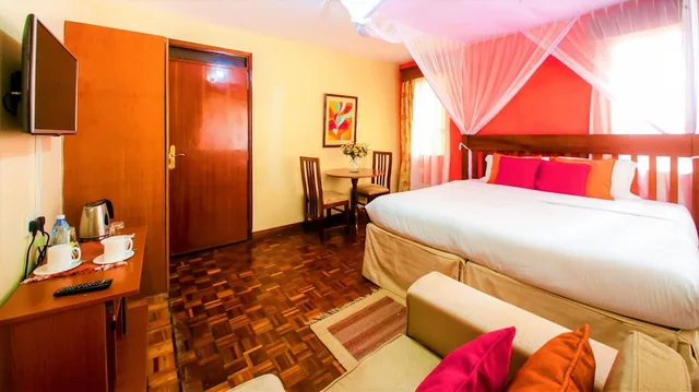 غرفة ديلوكس ركنية بسرير كينج بحمام خاص، Leon Villas Guest House 2/7