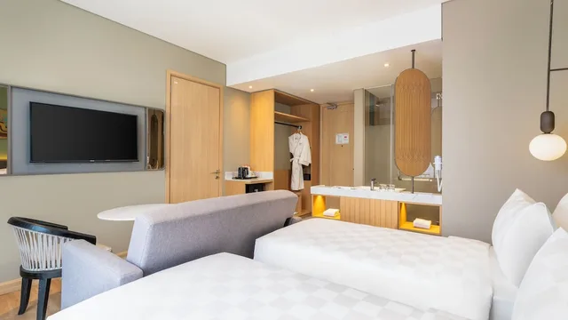 غرفة ديلوكس بسريرين منفصلين، Swiss-Belinn Indramayu 4/4
