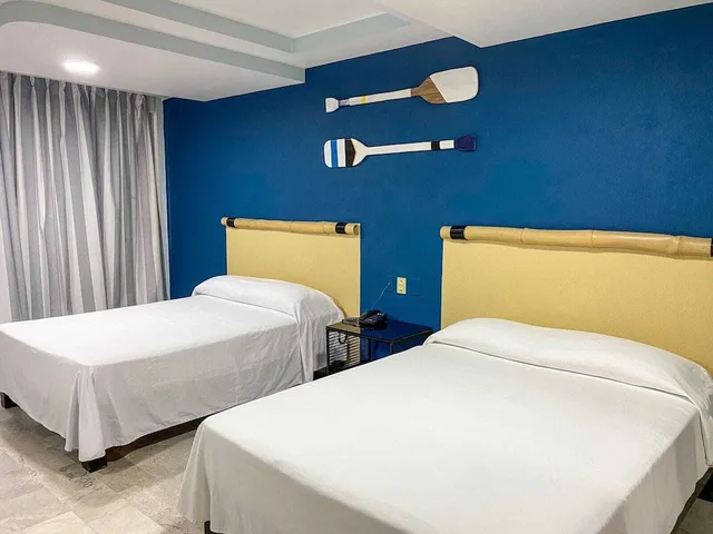 غرفة قياسية بسريرين مزدوجين بإطلالة على المسبح، Acamar Beach Resort Acapulco 2/4