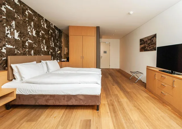 غرفة عائلية بسرير فردي، Sihlpark Hotel 2/5