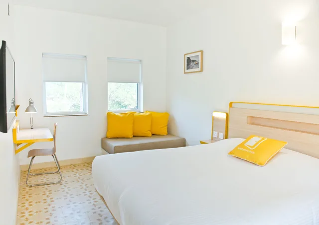 غرفة قياسية بسرير كينج، Bloomrooms At Calangute 1/3