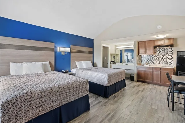 Standard, 2 Queen Beds, Kitchenette, Accessible, Blue Wave Inn 1/6