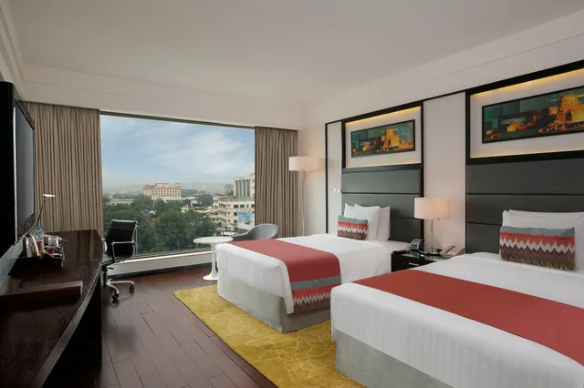 غرفة ديلوكس بسريرين منفصلين، Crowne Plaza Pune City Centre 1/3