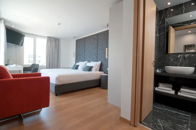 غرفة قياسية مفردة بسرير كوين، Athenaeum Smart Hotel 4/4